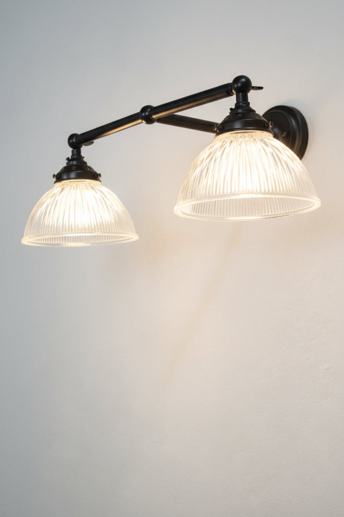 Holophane glass wall light with black sconce