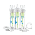 A set of three Dr. Brown's Accufeed Baby Bottles with Preemie Nipples (60cc), featuring green inserts and accompanied by extra bottle nipples, caps, and lids. These transparent bottles, displaying their labels and designs, are engineered to help reduce colic through a specialized venting system.