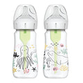 A 2-pack of Dr. Brown’s Natural Flow® Anti-Colic Options+™ Wide-Neck Baby Bottles, each 9 oz/270 mL with Level 1 Slow Flow Nipples, featuring green inserts and ocean-themed illustrations—including an octopus, a whale, fish, and sea plants. Pediatrician recommended to help provide a comfortable feeding experience.