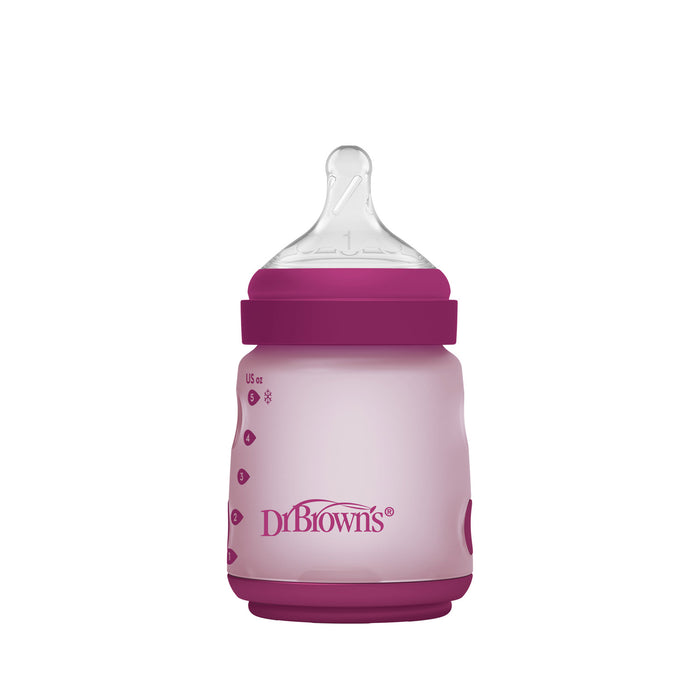 Pink Dr. Brown's silicone wide-neck baby bottle with purple cap