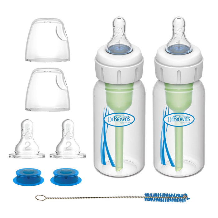 Dr. Brown’s Specialty Feeding System, 2 Count by Dr. Brown’s—including bottles with vent systems, extra nipples, bottle covers, blue caps, and a cleaning brush—arranged on a white background.