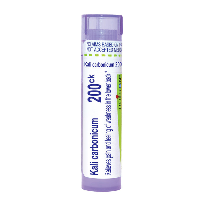 A single tube of Boiron Kali carbonicum 200ck homeopathic medicine, featuring a white label with blue and green text and accents, and a light purple cap and base, on a solid white background.