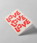'Love Love Love' Embossed Greetings Card - bubblegum market