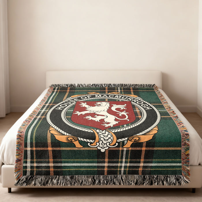 MacMurrogh family crest emblem woven blanket displayed on a bed