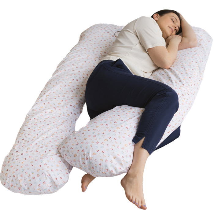 Organic U-shaped maternity pillow with an Organic Cotton Shell in floral pattern .
