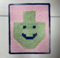 NEEDLE-POINT: DREIDEL